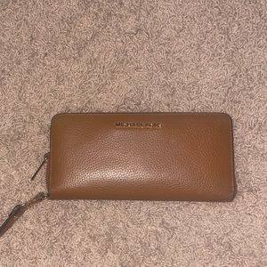 Brown Michael Kors wallet with wristband